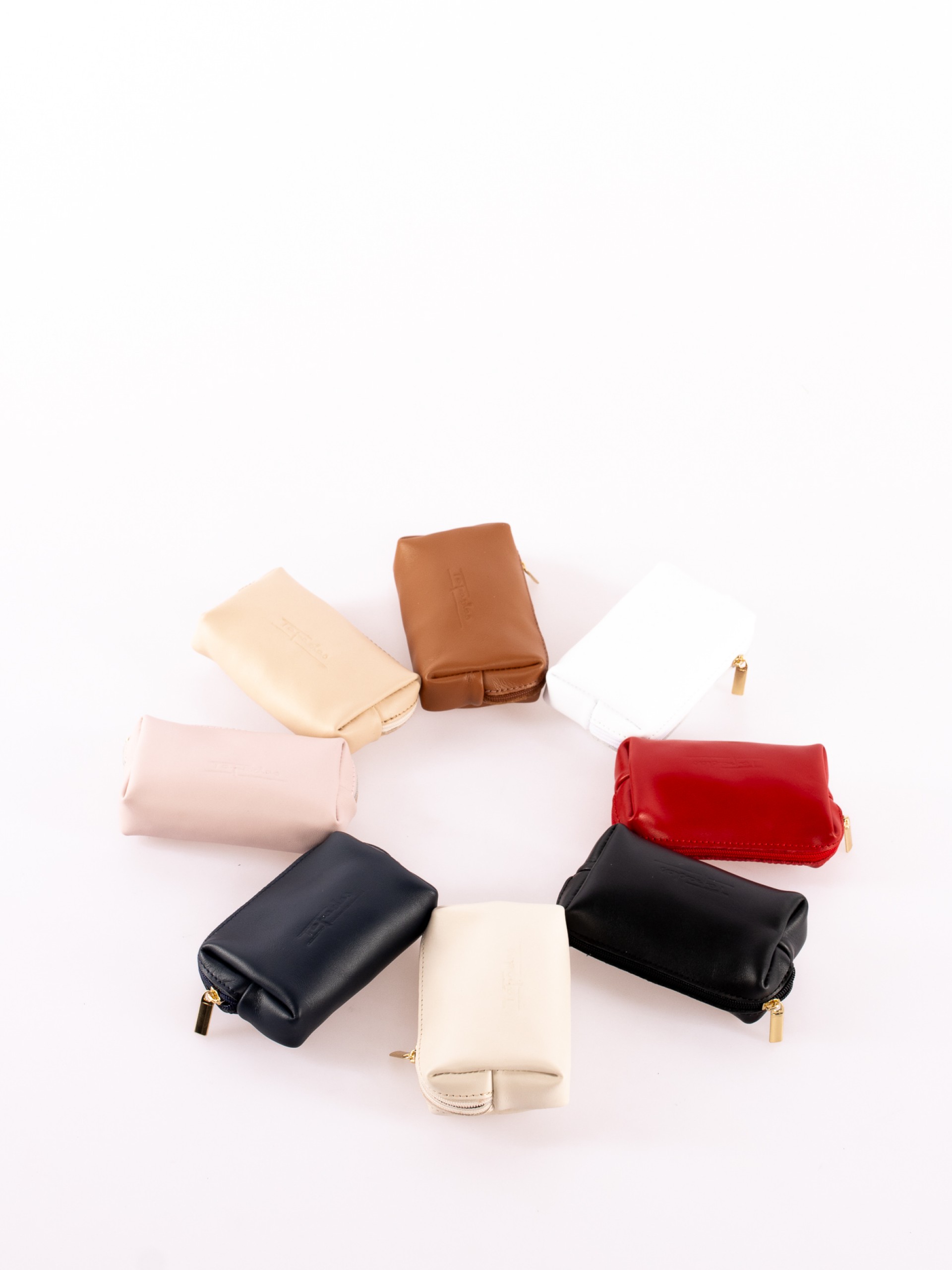 PORTA MOEDAS EM PELE