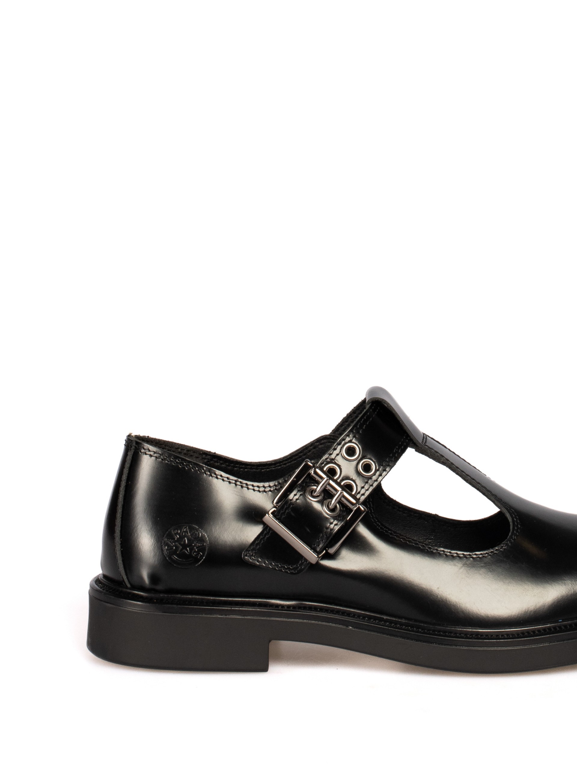 Polished leather shoe
with strap