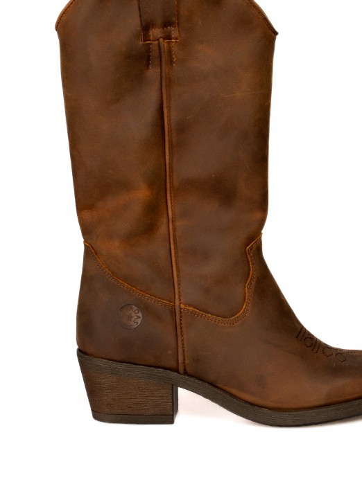 Bota texana com pele oleada Bota texana com pele oleada