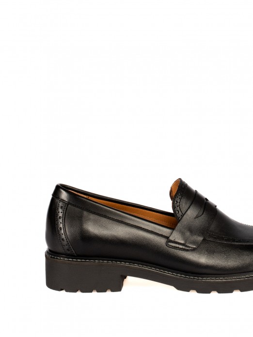 High-Soled Leather Moccasin.