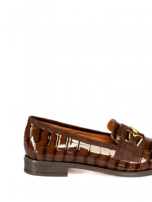 Mocassim em Verniz 
com aplicao