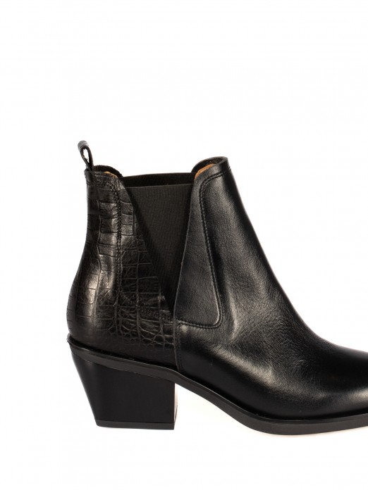 Botim Texano em Pele