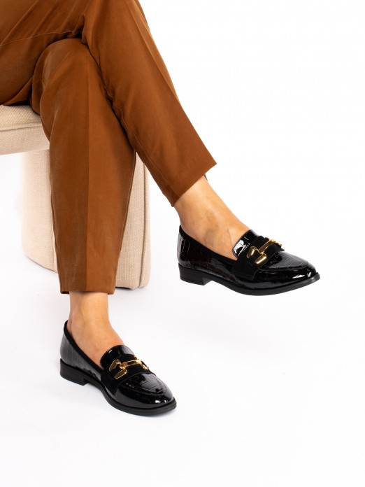 Mocassim em Verniz 
com aplicao