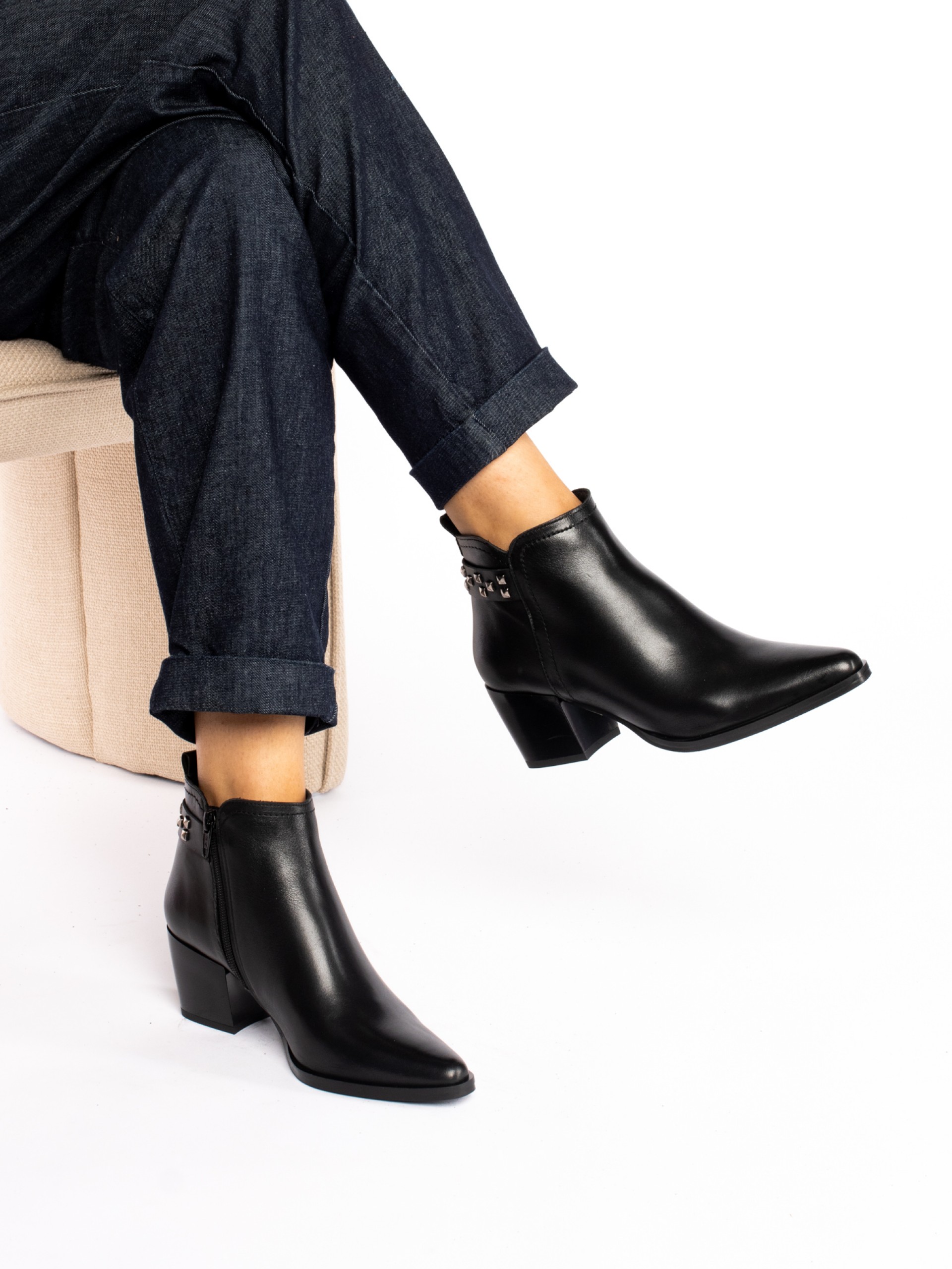 Leather ankle boots with studded straps