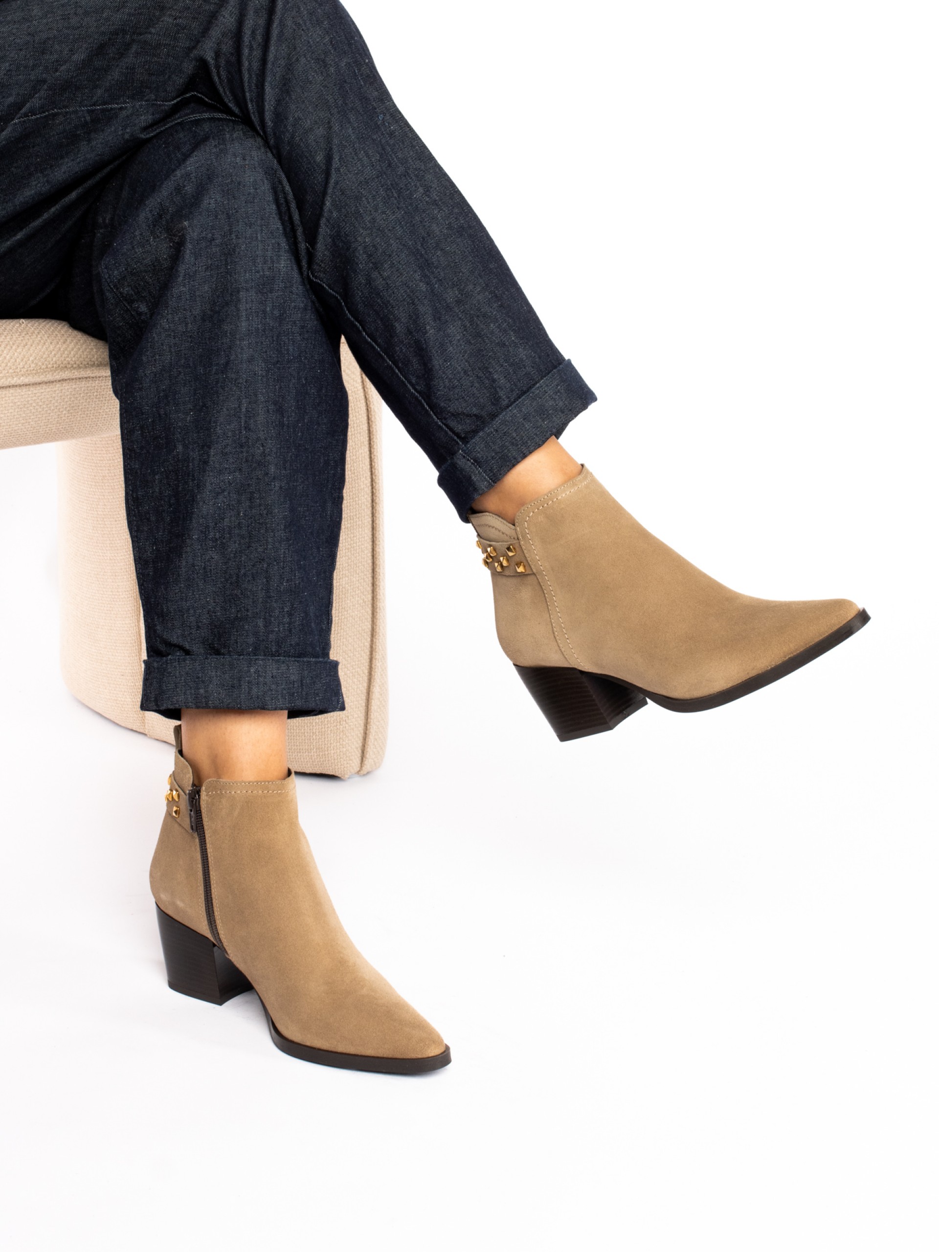 Suede ankle boots with studded strap