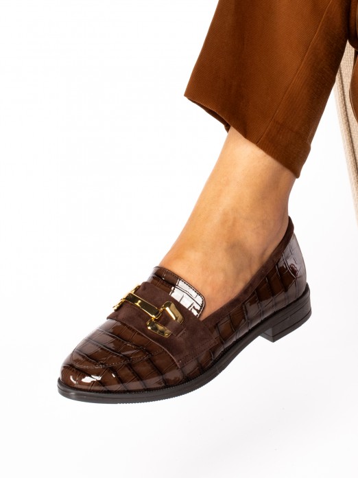 Mocassim em Verniz 
com aplicao