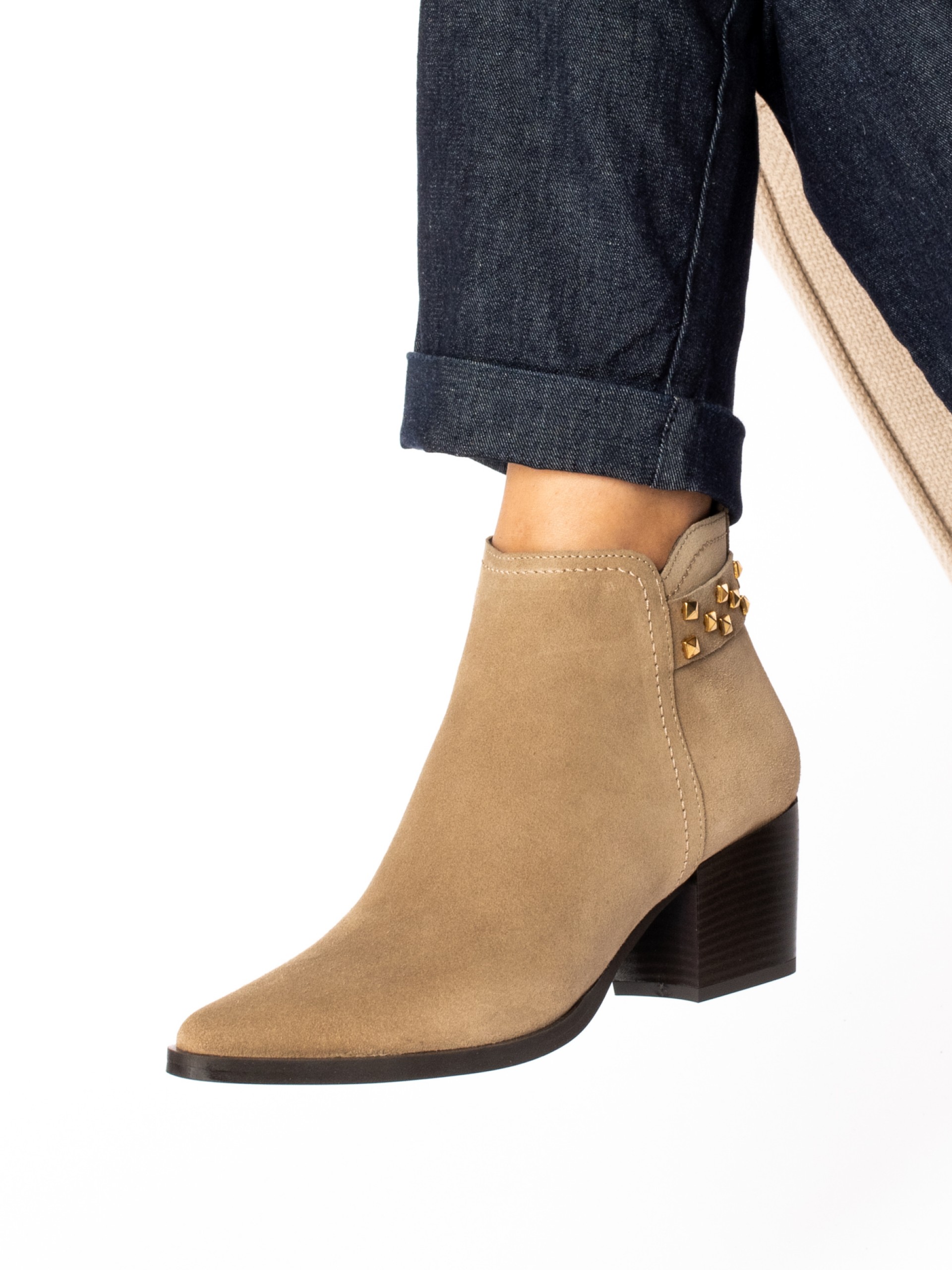 Suede ankle boots with studded strap