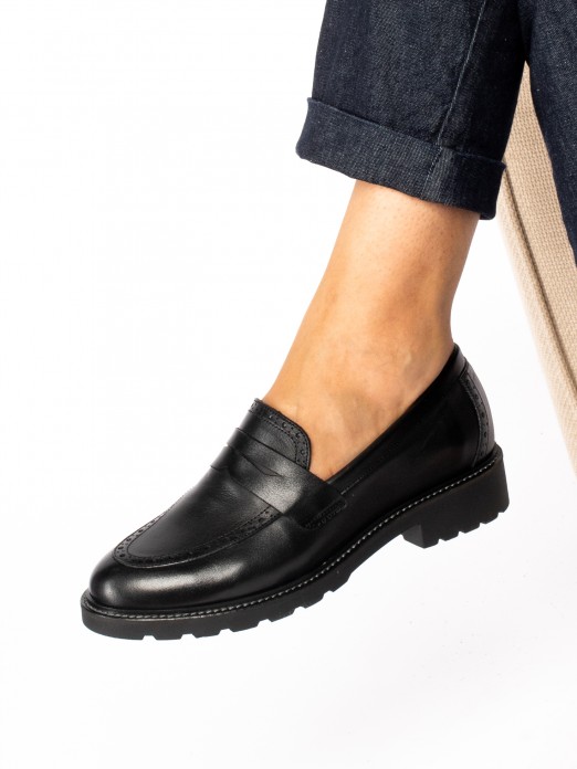 High-Soled Leather Moccasin.