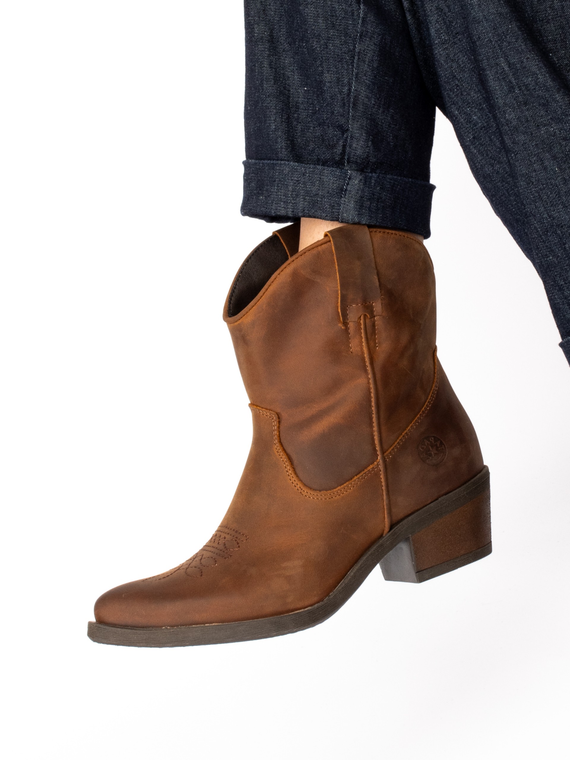 Botim texano em pele oleada