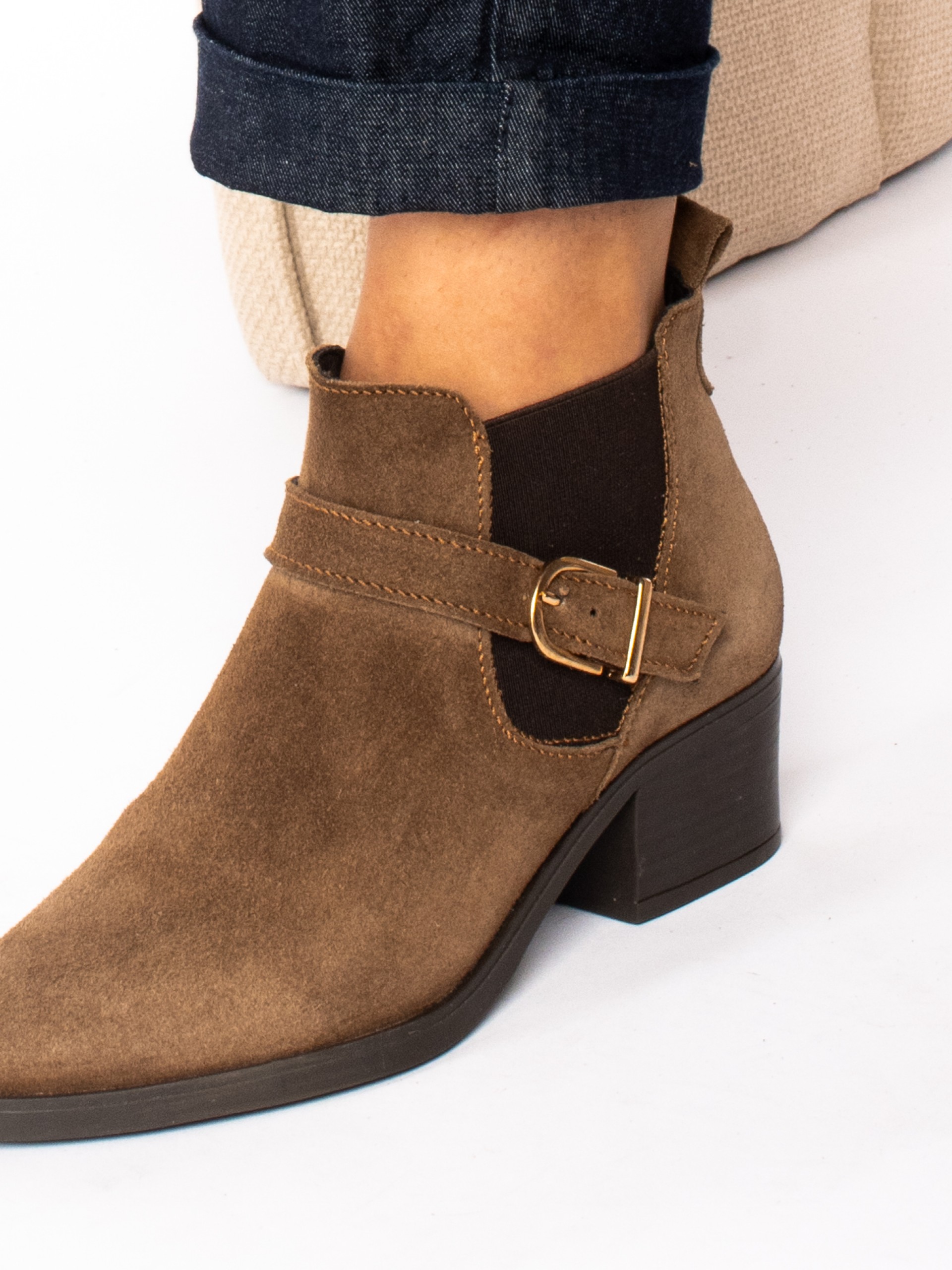 Suede ankle boots with elastic and buckle