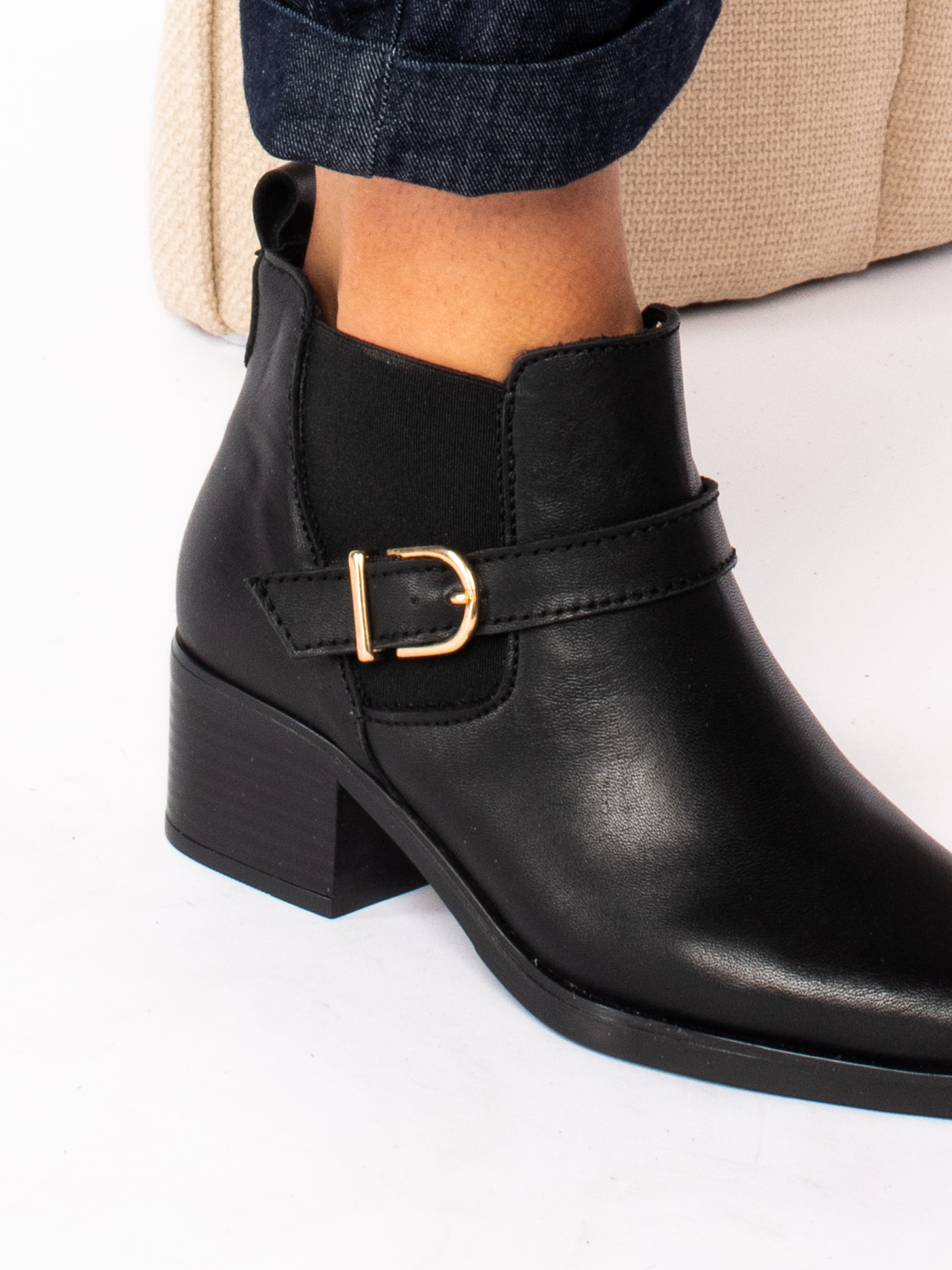 Ankle boots with elastic and leather buckle