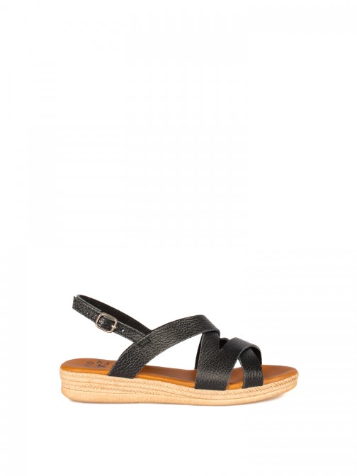 Low Wedge Sandal
with Crossed Straps in Leather