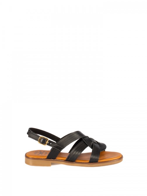 Women�s Flat Leather Sandal
with Braided Straps