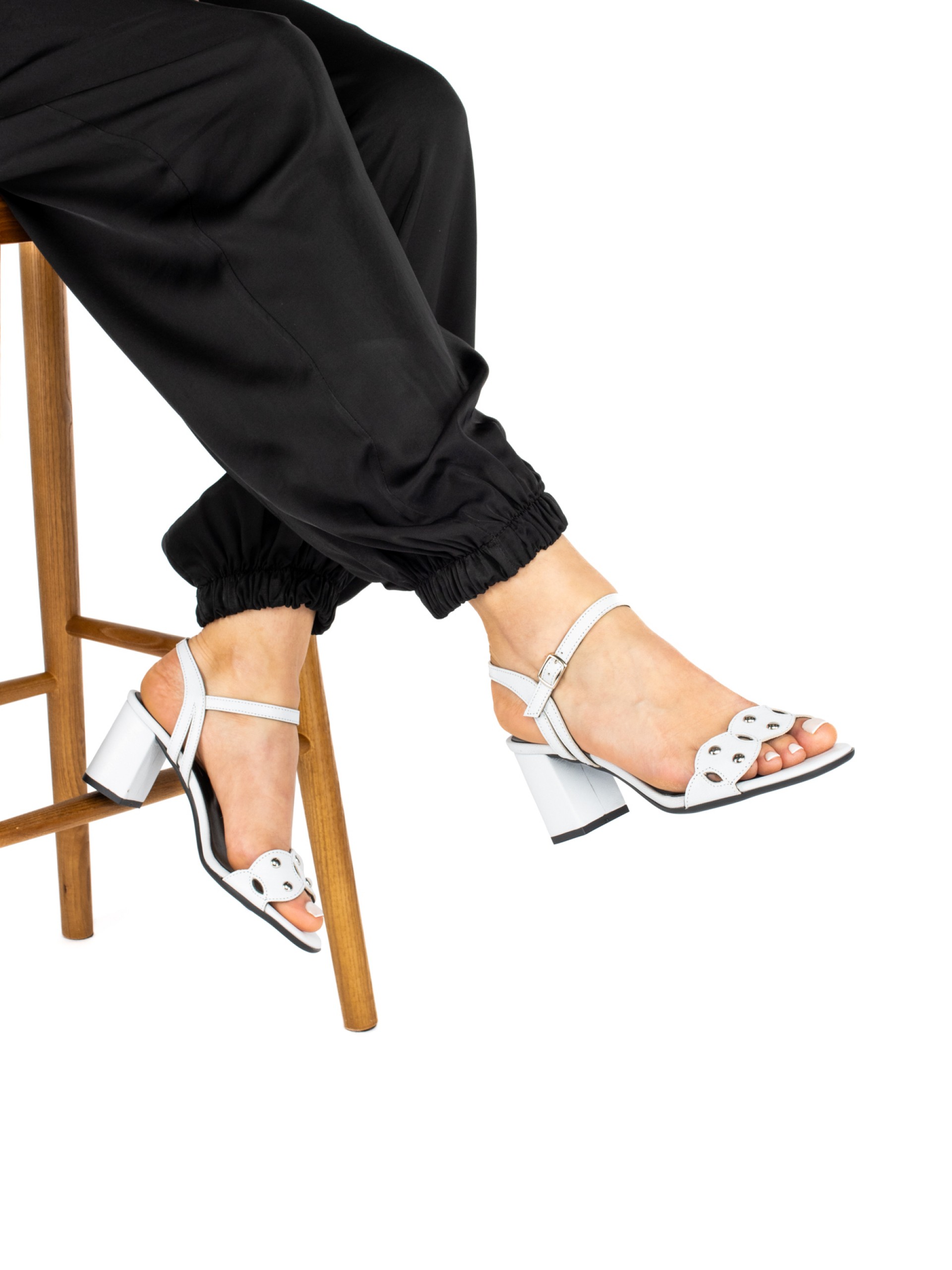 High-heeled leather sandal with studs