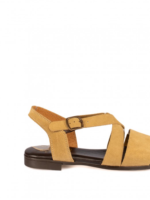 Women’s Flat Suede Sandal
with Braided Straps Women’s Flat Suede Sandal
with Braided Straps