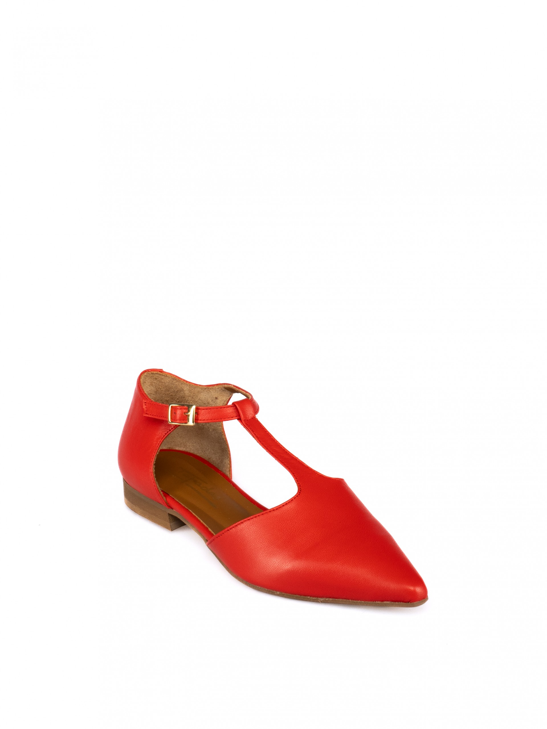 Women's flat leather shoe with T-strap.