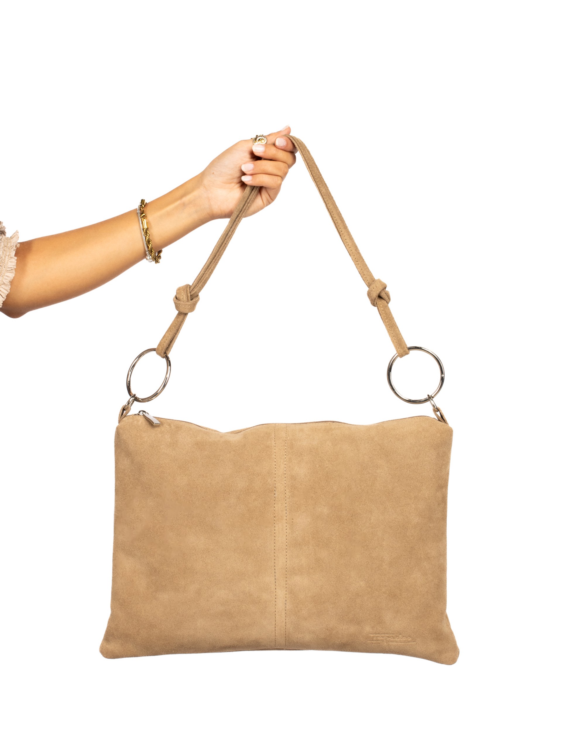 Suede shoulder bag with metal rings.