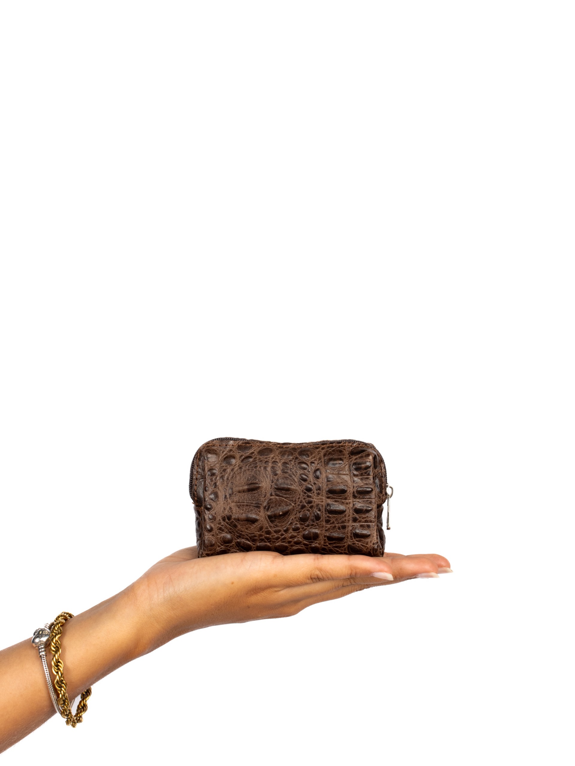 Coin purse in suede and crocodile skin.
