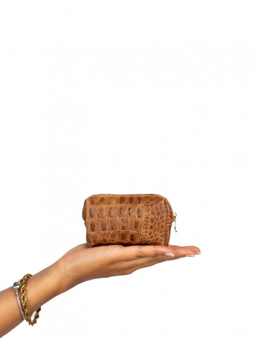 Coin purse in suede and crocodile skin. Coin purse in suede and crocodile skin.
