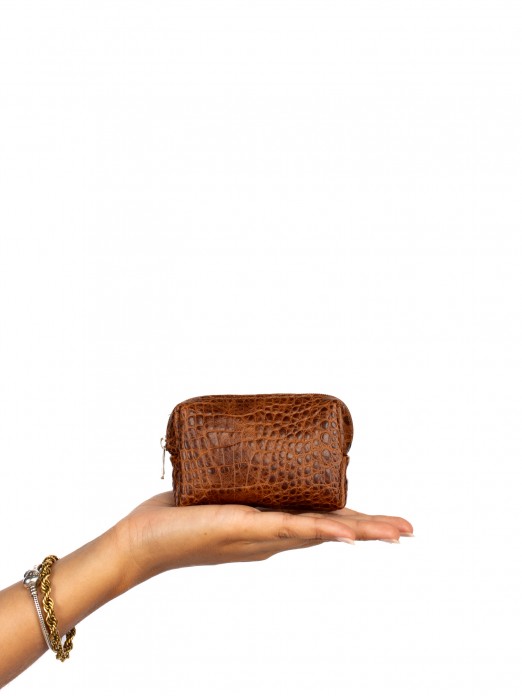 Coin purse in suede and crocodile skin. Coin purse in suede and crocodile skin.