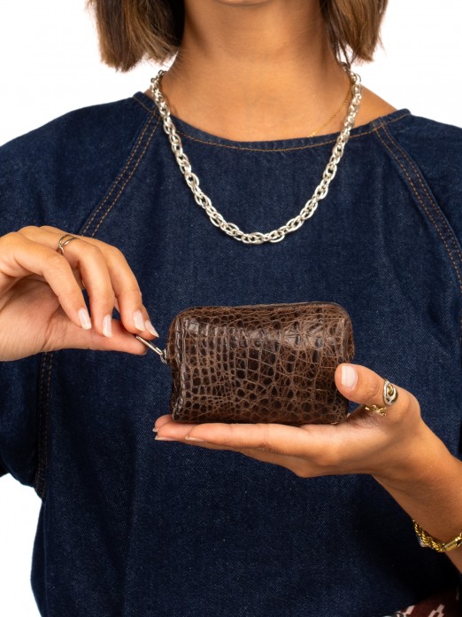Coin purse in suede and crocodile skin. Coin purse in suede and crocodile skin.