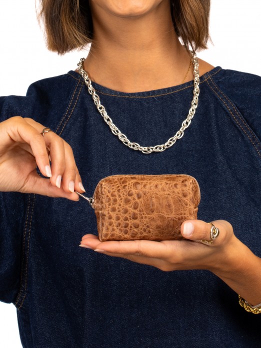 Coin purse in suede and crocodile skin. Coin purse in suede and crocodile skin.